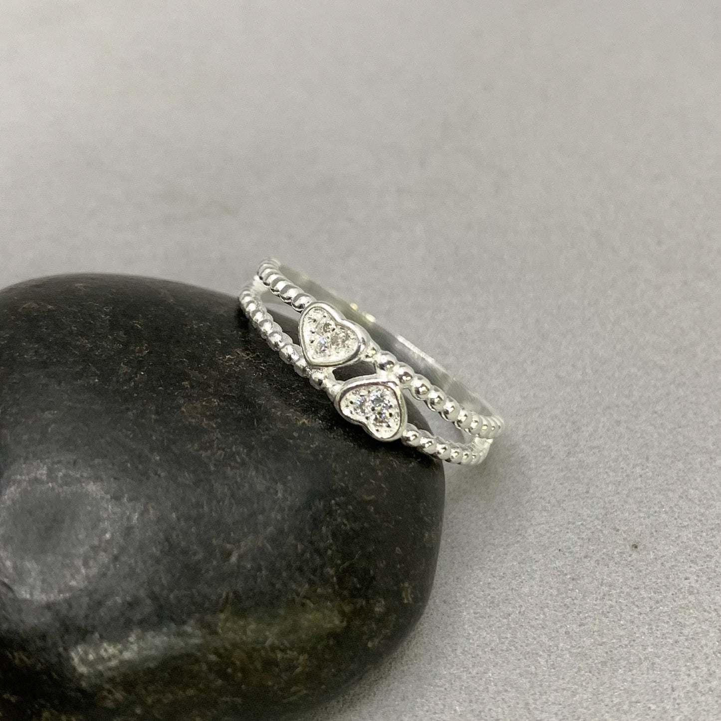 Anillo doble corazón