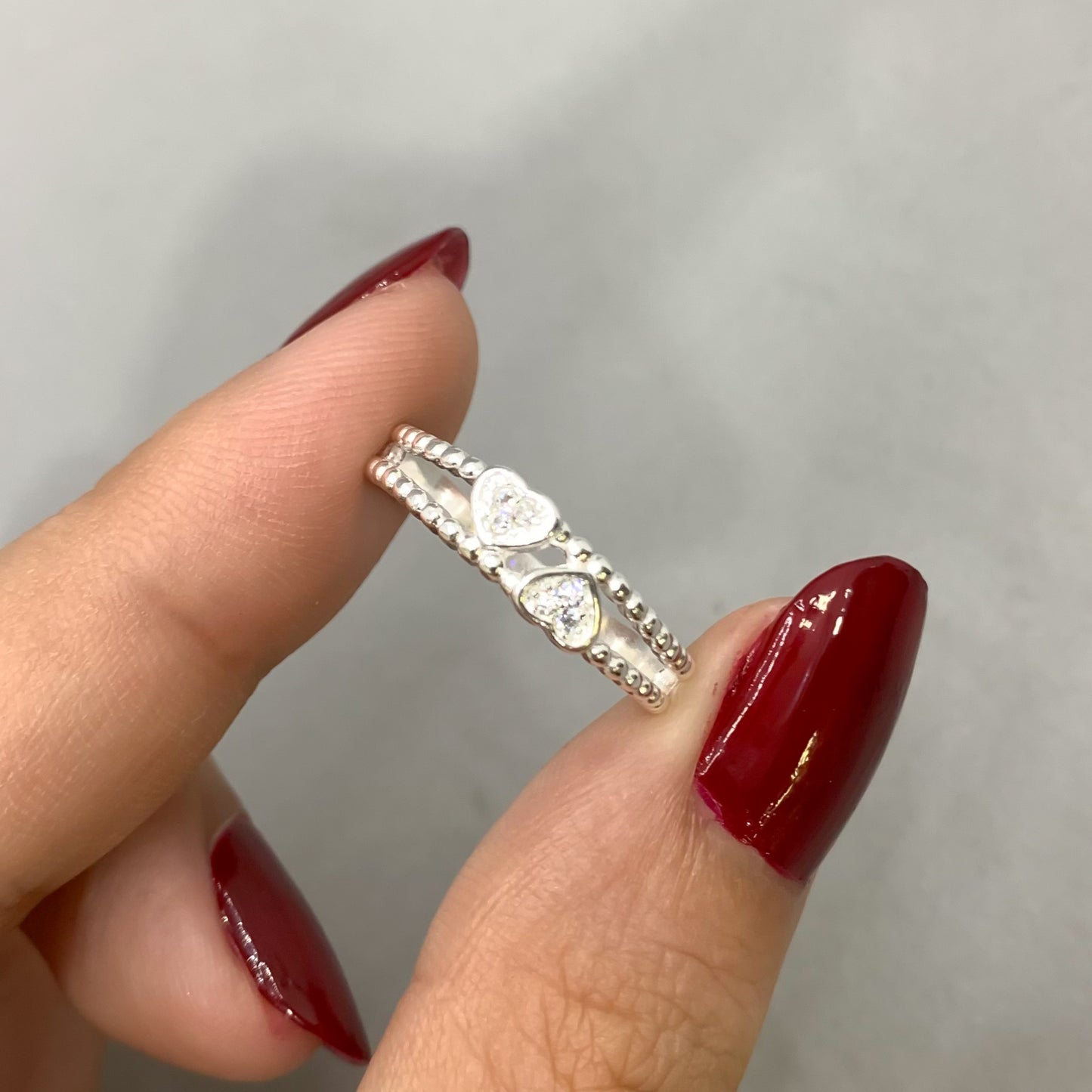 Anillo doble corazón