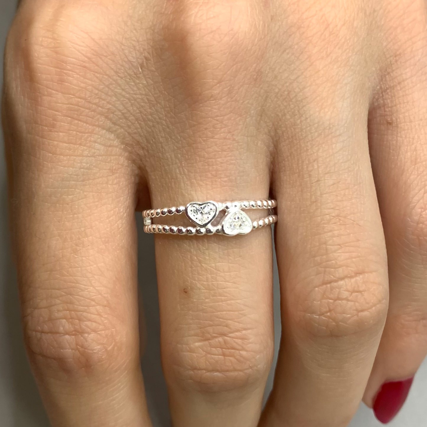 Anillo doble corazón